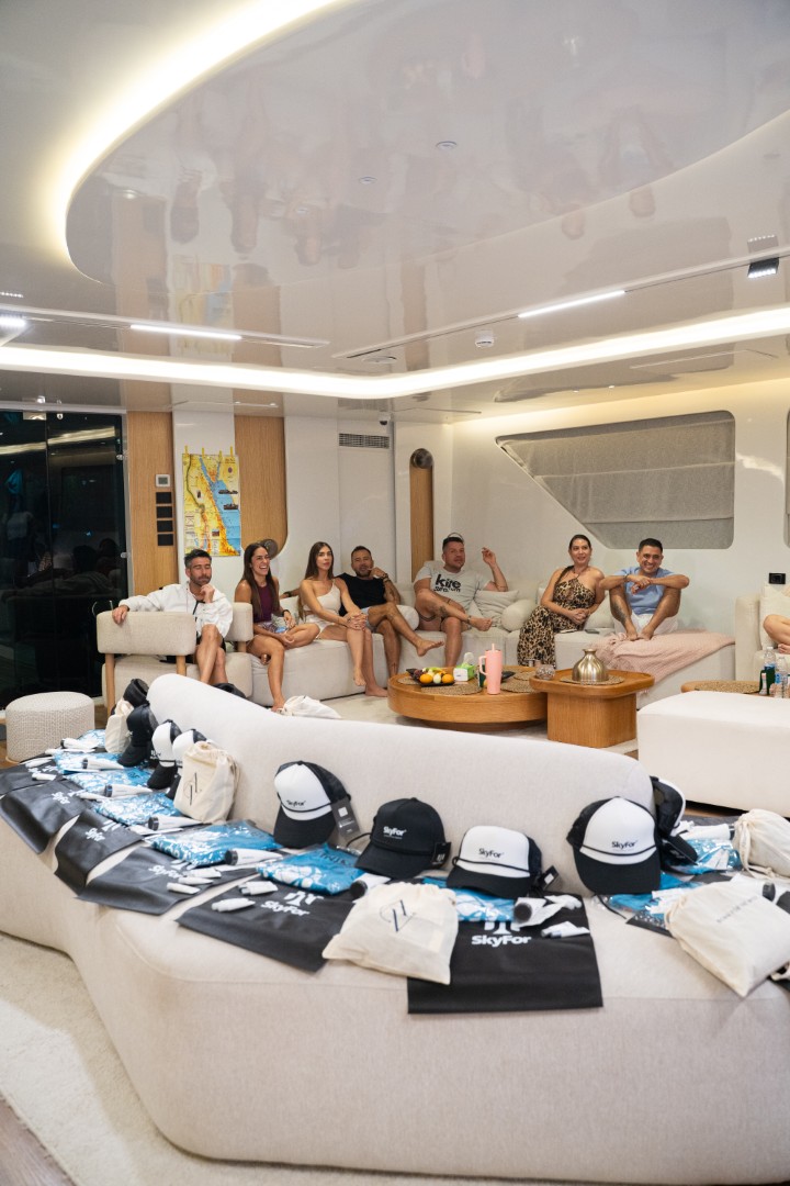 Travelers relaxing in the yacht's lounge