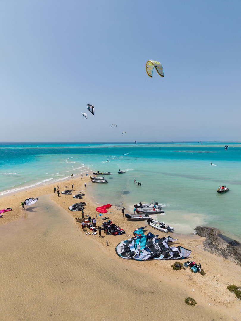 Aerial view of the turquoise islands and reefs of the Red Sea route